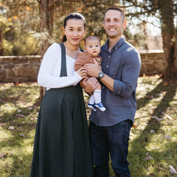 Happy family smiling outdoors